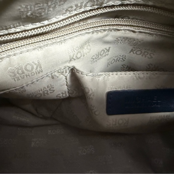 MK bag gray with navy blue logo used in good condition 
Is 10” x 6 1/2” - Picture 8 of 8